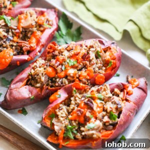 Stuffed sweet potatoes on platter.