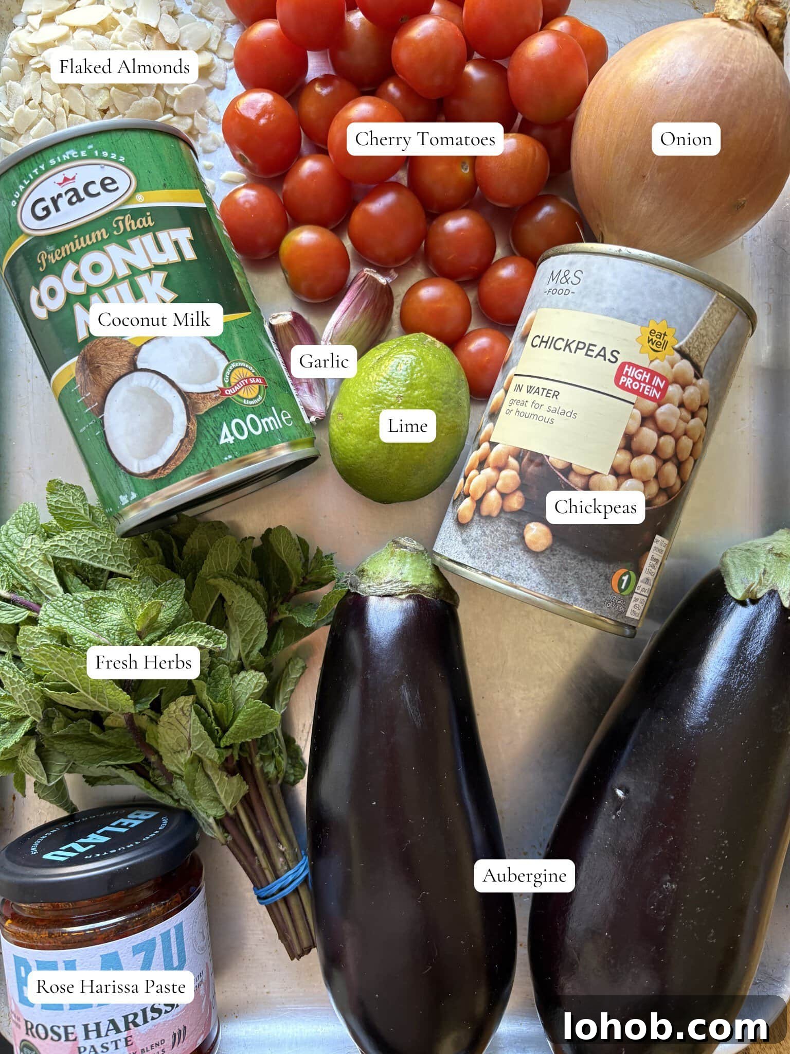 labelled ingredients needed for aubergine curry.