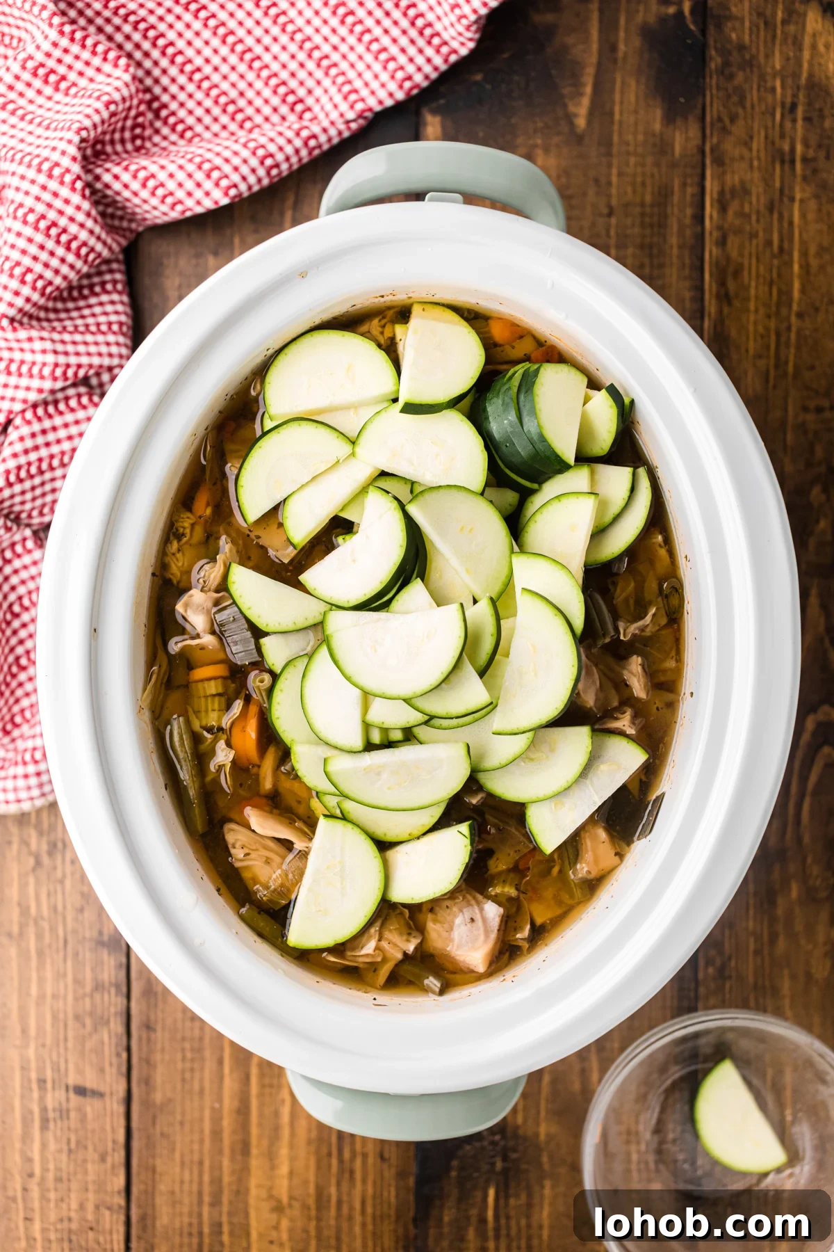 Metabolism-Boosting Vegetable Soup for Fast Weight Loss 6 Zucchini added to cooked soup in a crockpot.