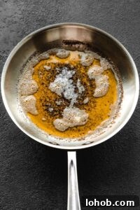 Browned Butter: Simple Step-by-Step Guide for Perfect Flavor 9 Butter beginning to brown in a skillet.
