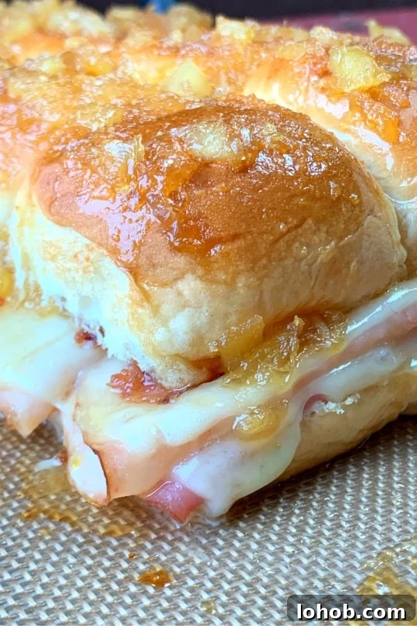 Pineapple and brown sugar glaze on a ham and turkey slider