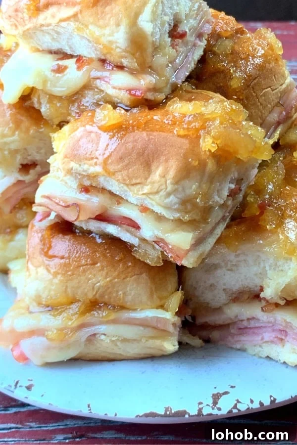 Stack of lunchmeat ham and turkey melt sliders