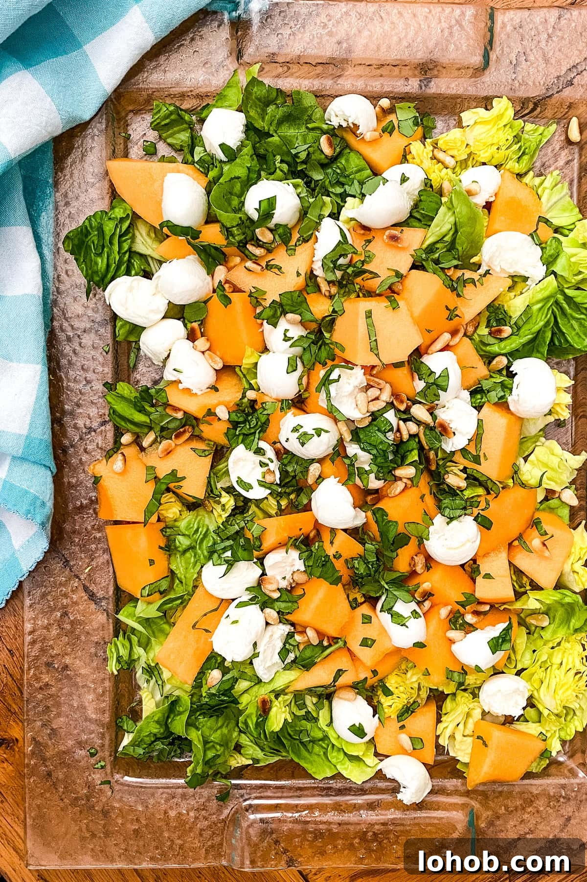 Cantaloupe and Fresh Mozzarella Salad with Toasted Pine Nuts 4 summer cantaloupe with fresh mozzarella and pine nuts