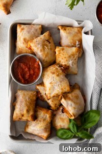 overhead shot of tray of air fryer pizza rolls