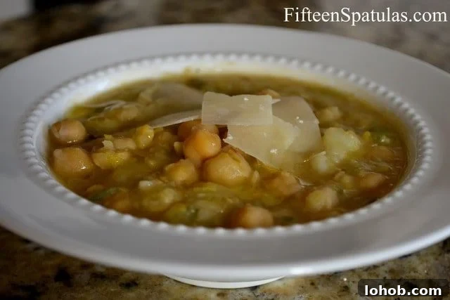 ChickpeaLeekSoup Chickpea Leek Soup - In a bowl garnished with cheese