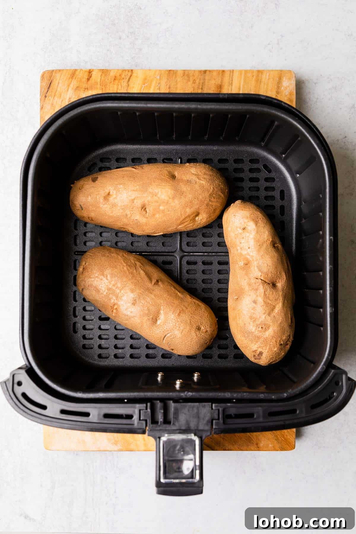 making the recipe with potatoes in the air fryer
