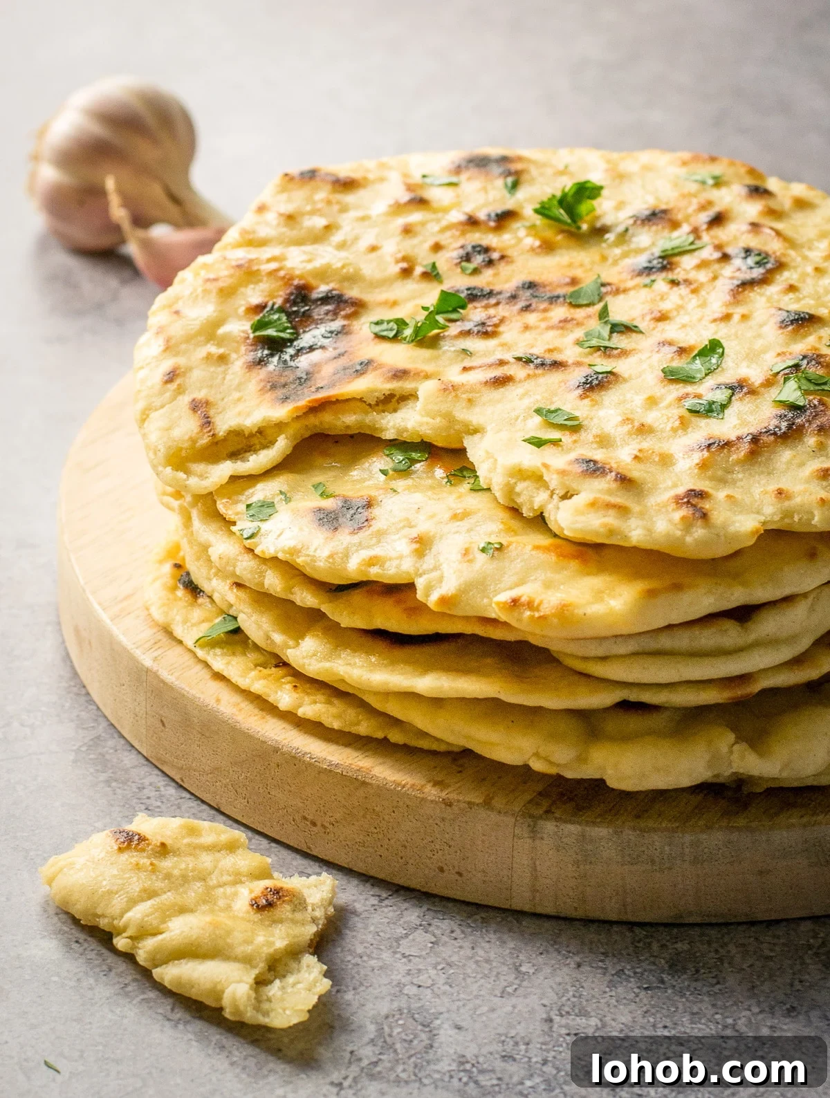 Flatbread Recipe Vegan - pile with chunk taken out