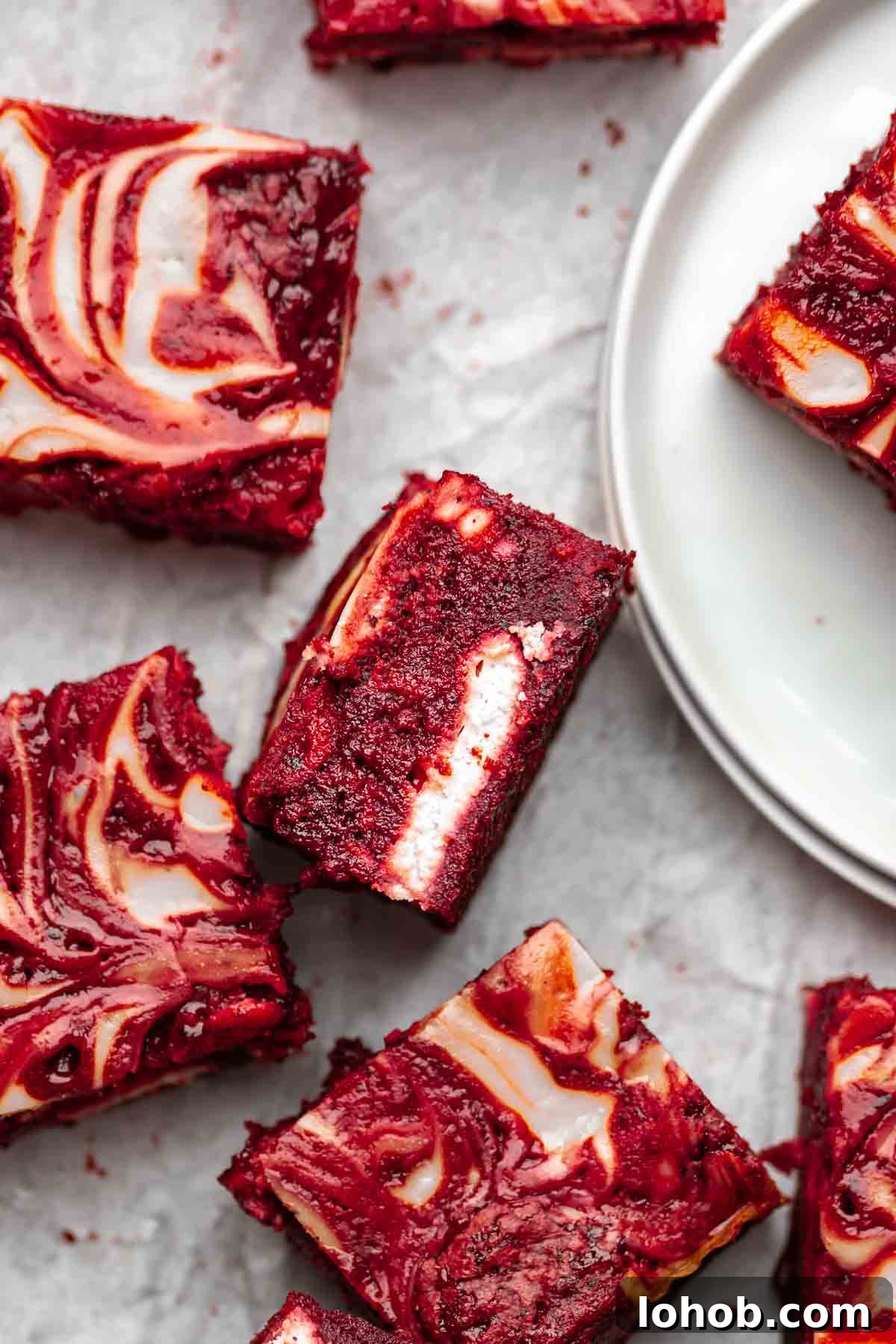 Fudgy Red Velvet Brownies with Cream Cheese Swirl 13 Red velvet brownie on its side to show the cream cheese layer.