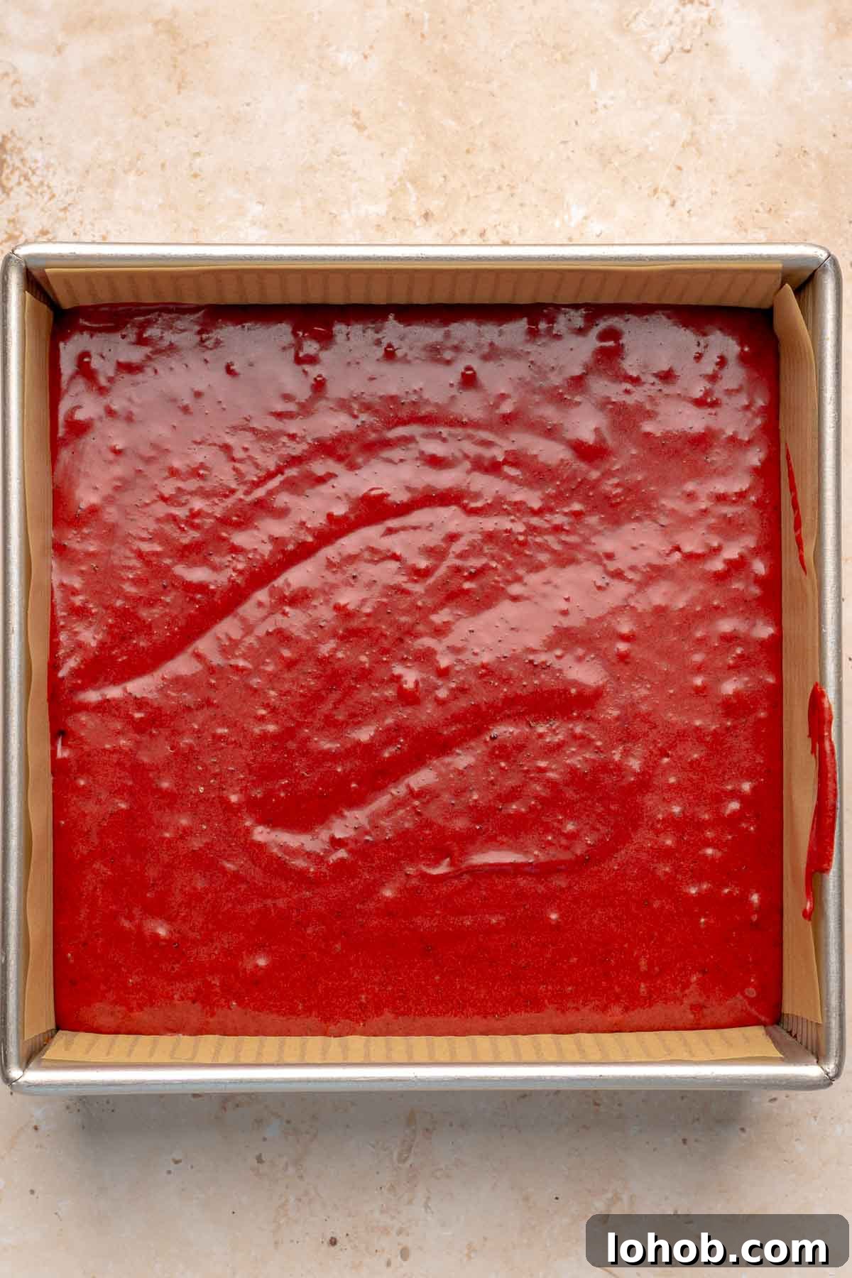 Fudgy Red Velvet Brownies with Cream Cheese Swirl 8 Red velvet brownie batter in a prepared square pan.