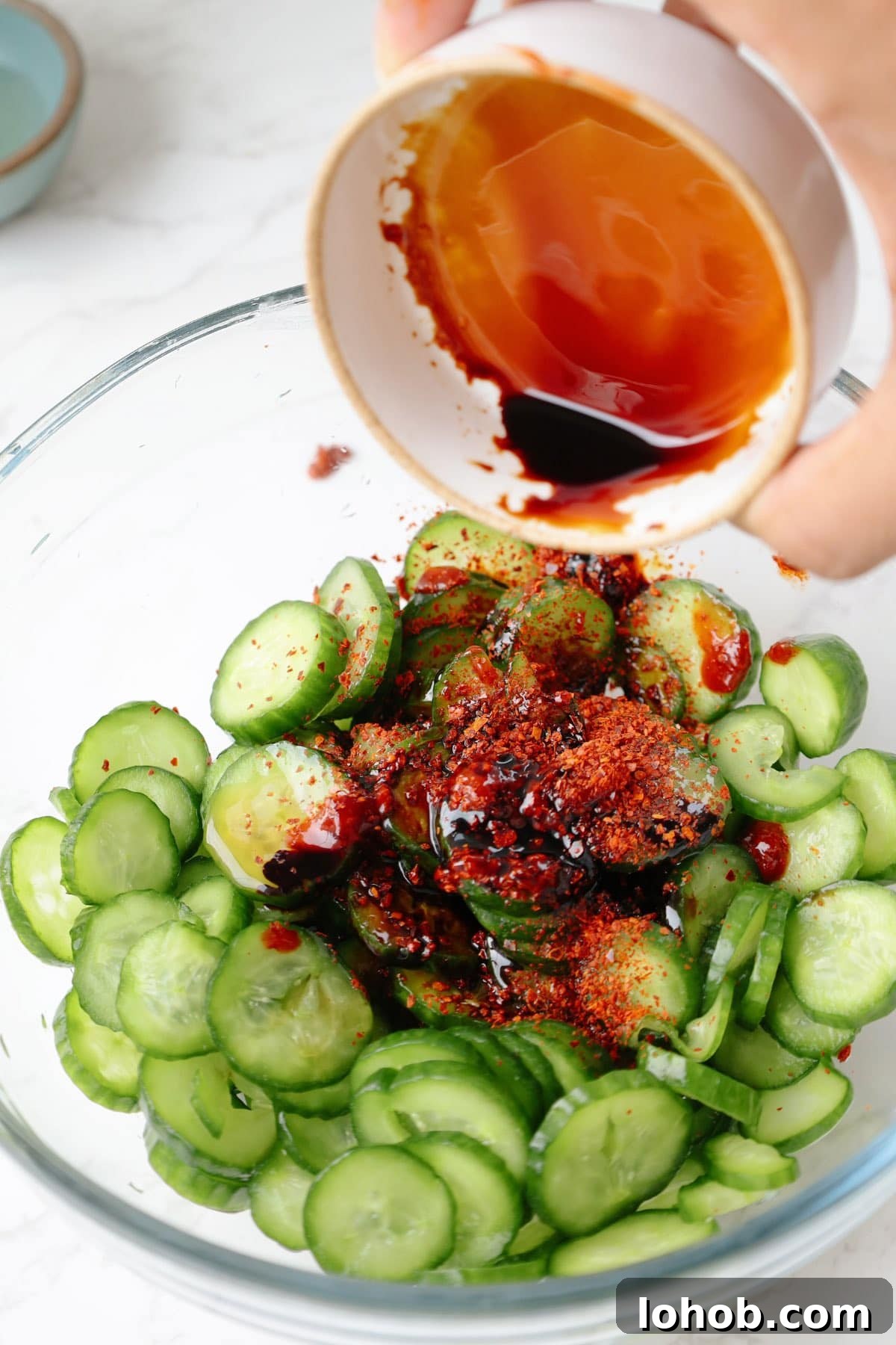 Korean Cucumber Salad (Oi Muchim) Recipe for Bold, Crunchy Flavor 5 Step two: add the sauces to the cucumbers.