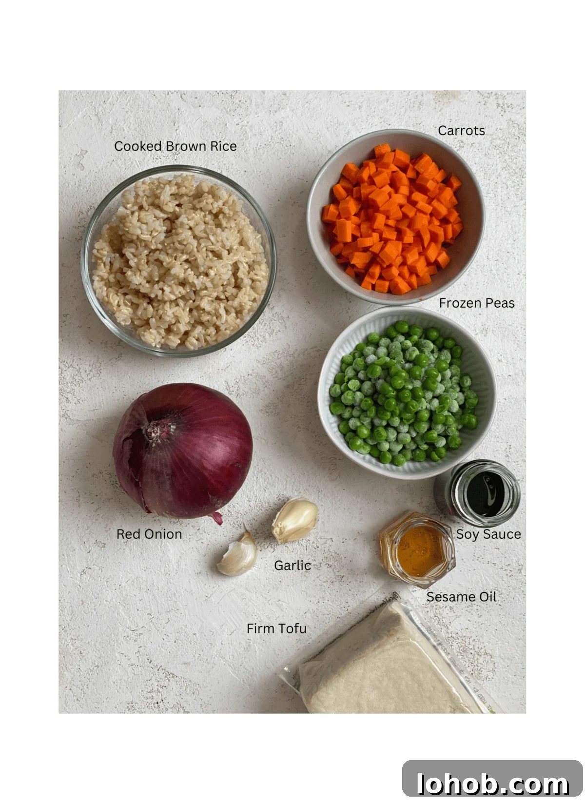 ingredients for Easy Vegetable Brown Fried Rice measured out against a light surface
