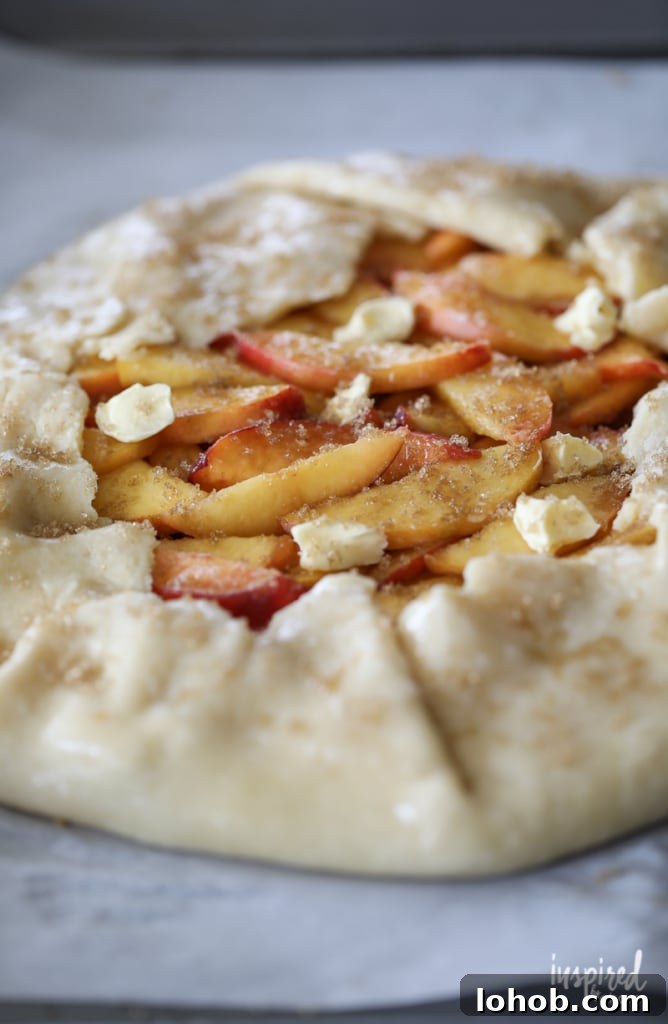 Rustic Peach and Almond Crostata Recipe for Summer Baking 8 This Peach and Almond Crostata is an easy and delicious dessert idea made with fresh peach and crunchy almonds.