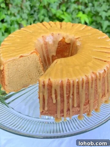 Caramel Espresso Pound Cake, sliced, on a cake pedestal.
