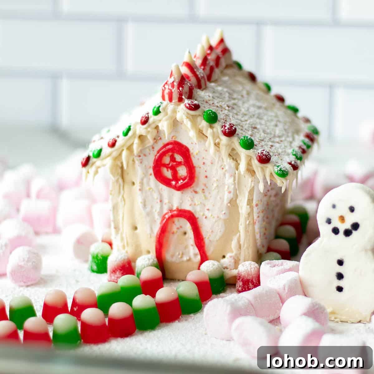 Gingerbread Pop-Tart House Tutorial: Holiday Dessert Craft Guide 17 pop tart gingerbread house decorated with candy and marshmallows