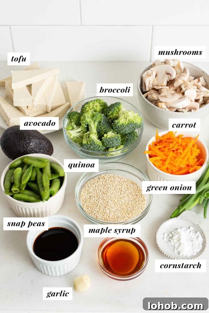 Labelled ingredients for making a teriyaki quinoa bowl.
