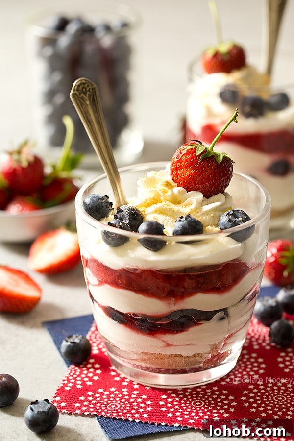 Red White and Blue Cheesecake In A Cup with spoon