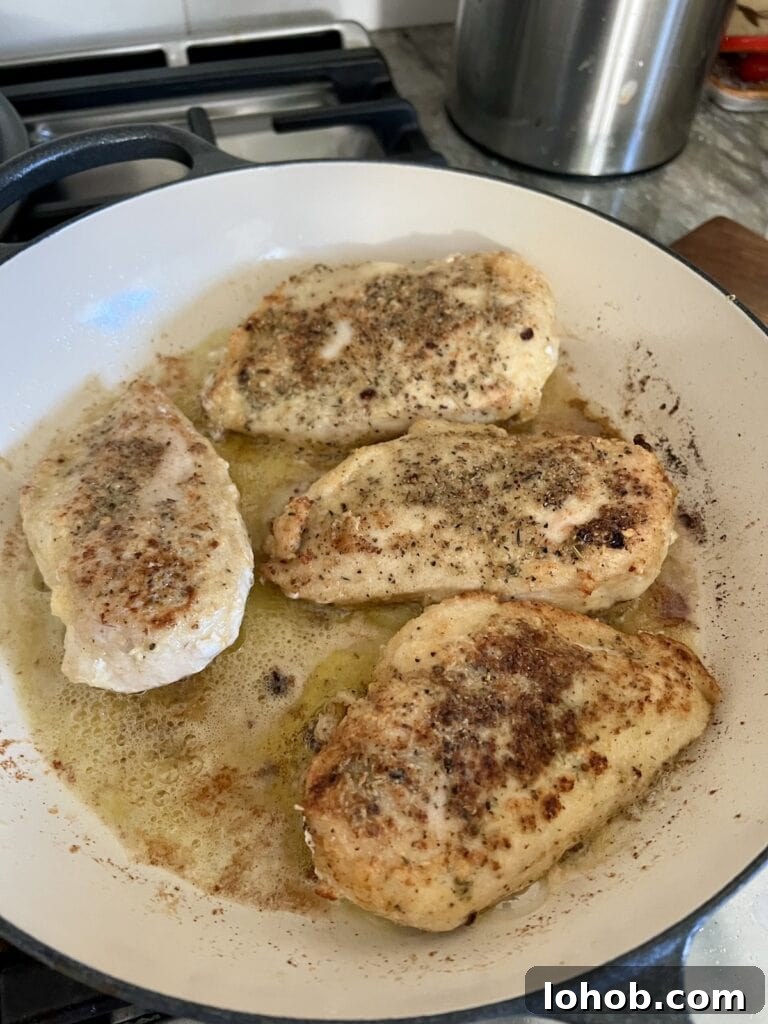 One-Pan Chicken Pomodoro Recipe for Quick Weeknight Dinners 12 Chicken breast browning in pan.