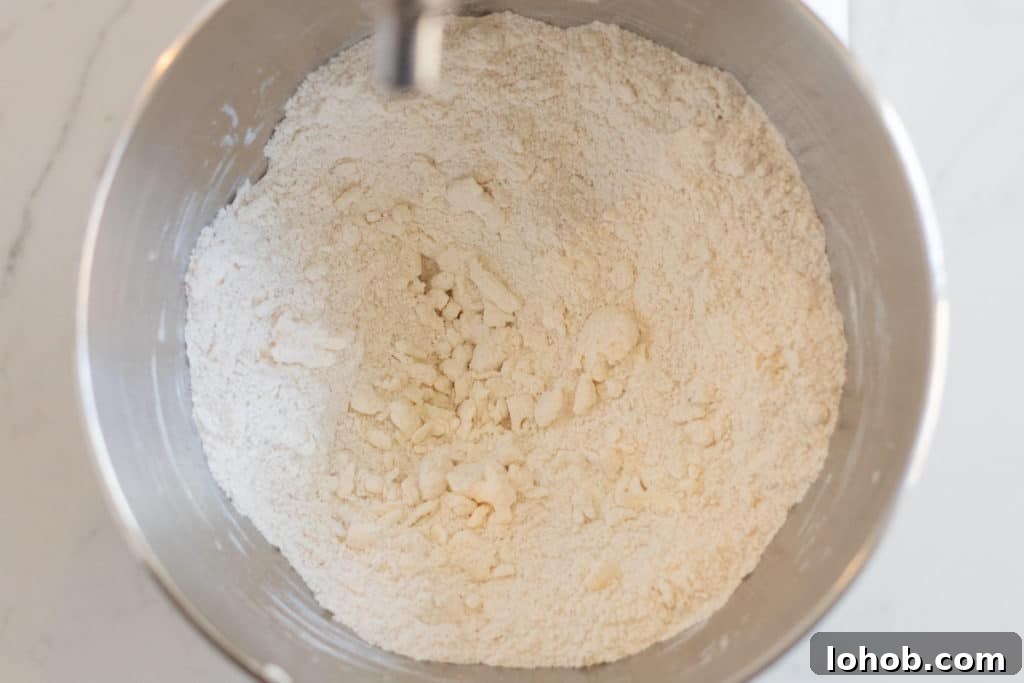 Strawberry Cream Scones with Vanilla Glaze 4 Butter incorporated into lavender scone dough