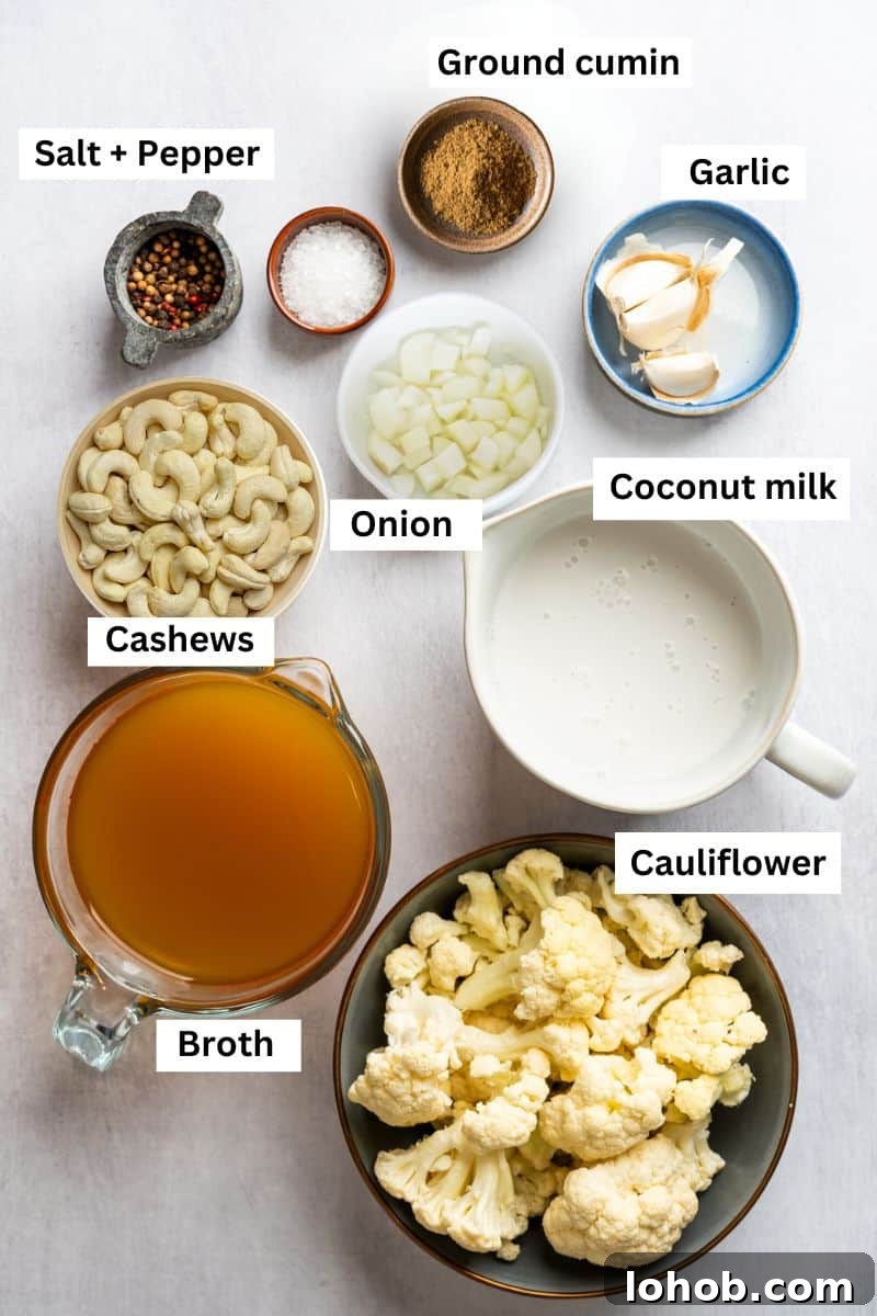 Instant Pot Creamy Cauliflower Soup — Vegan & Low-Calorie 2 The ingredients needed to make a cauliflower soup separated into bowls including cauliflower, broth, coconut milk, cashews and spices.