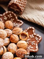 walnut shaped oreshki cookies on a plate