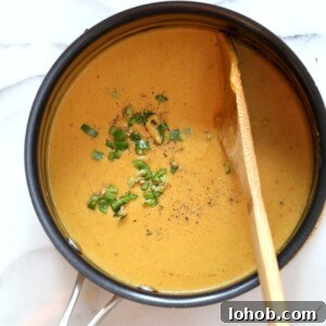 10 Minute Vegan Nacho Cheese Sauce. Easy Creamy Vegan Queso Dip. For Nachos, salads, tacos and more. Vegan Nut-free Recipe. | VeganRicha.com
