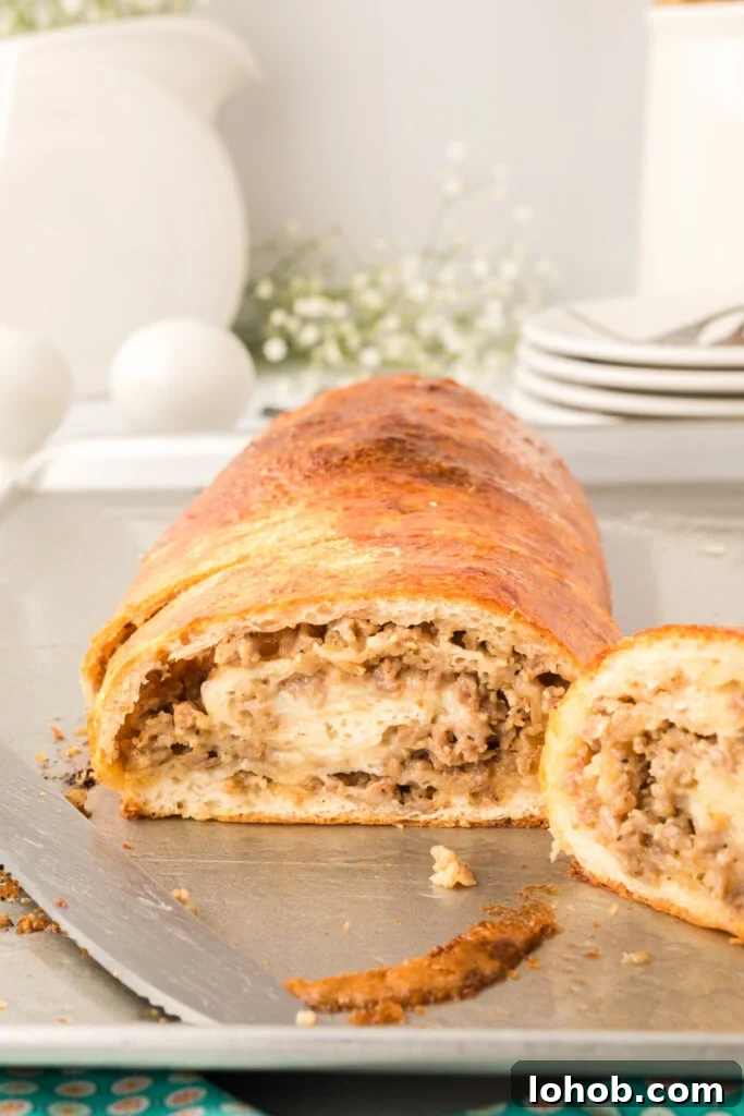 Homemade Sausage Bread Recipe: Savory Stuffed Loaf for Any Meal 4 sausage bread on baking sheet