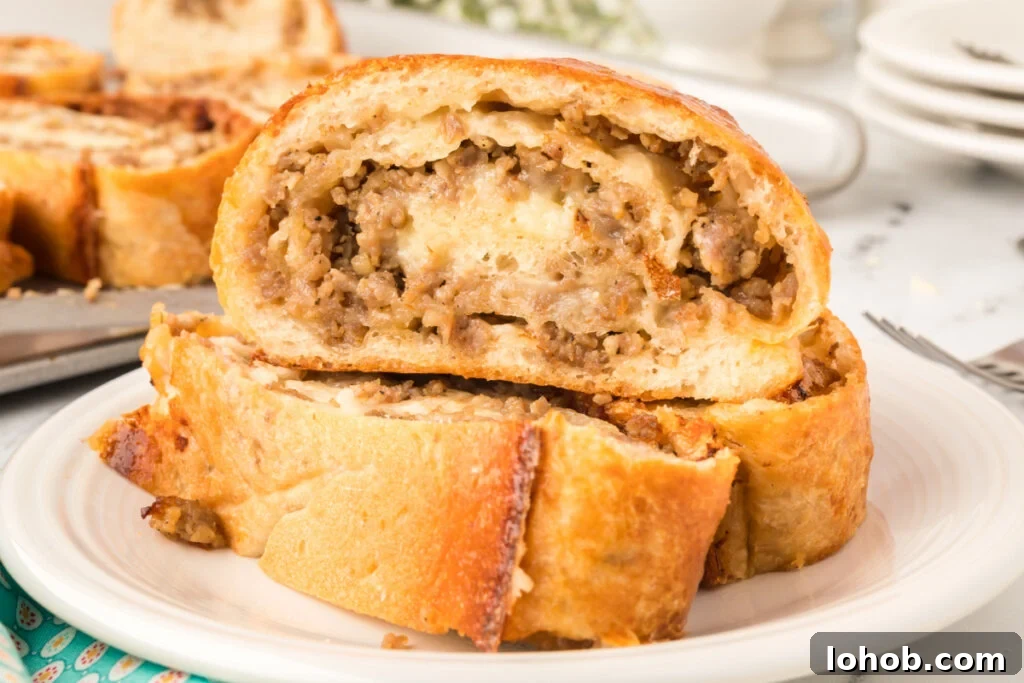 Homemade Sausage Bread Recipe: Savory Stuffed Loaf for Any Meal 6 three slices of sausage bread on plate