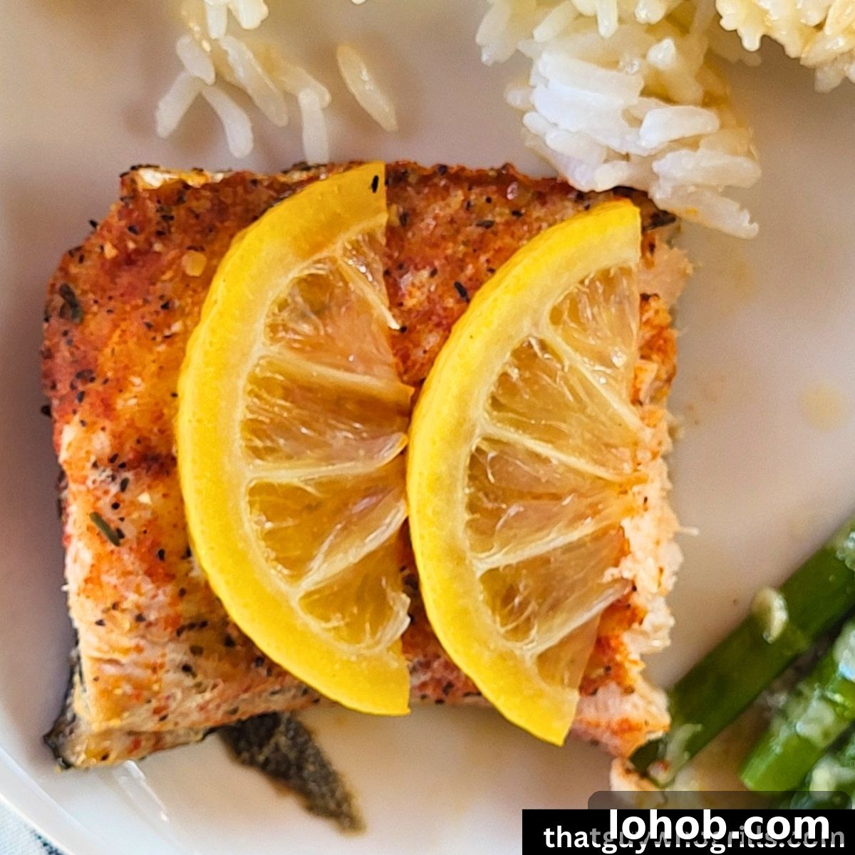 Grilled Salmon in Foil Packets with Lemon and Herbs 7 Foil packet grilled salmon served with a lemon slice