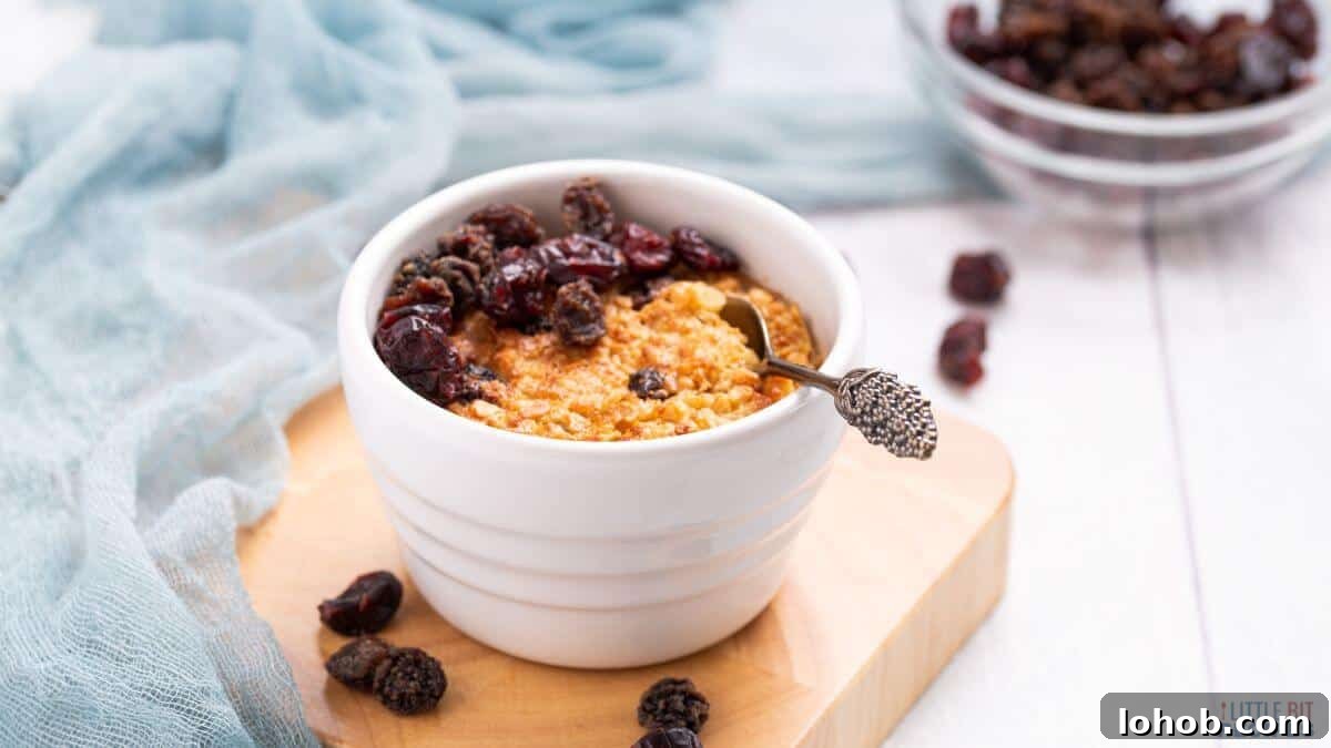 Single serve baked oatmeal in serving bowl with spoon.