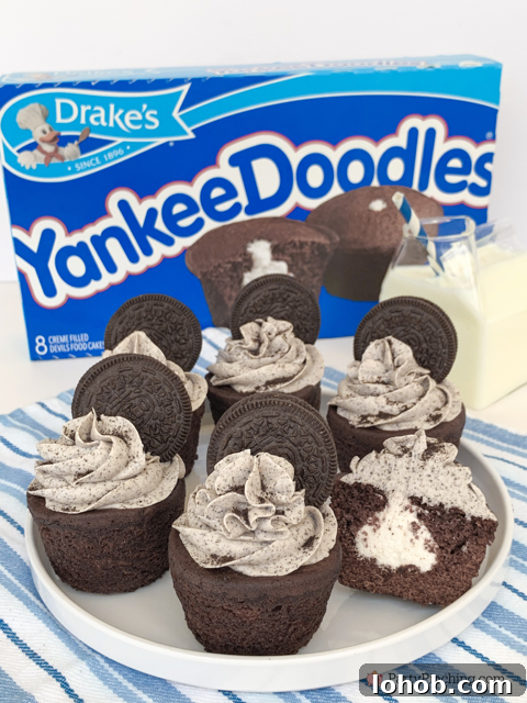 Cookies and Cream Stuffed Layer Cake Recipe 3 assembled cookies and cream filled cakes