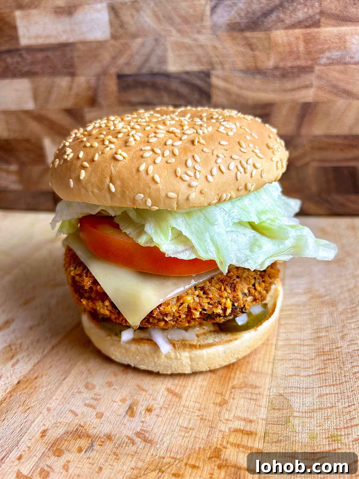 Chickpea-Crusted Black Bean Burger Recipe for Crispy Veggie Burgers 2 black bean chickpea burger on cutting board
