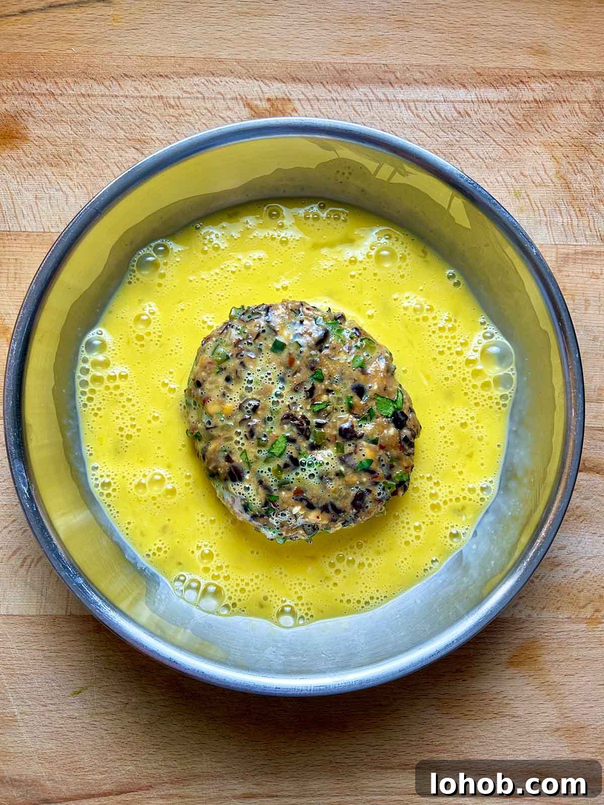 Chickpea-Crusted Black Bean Burger Recipe for Crispy Veggie Burgers 12 patty in egg wash