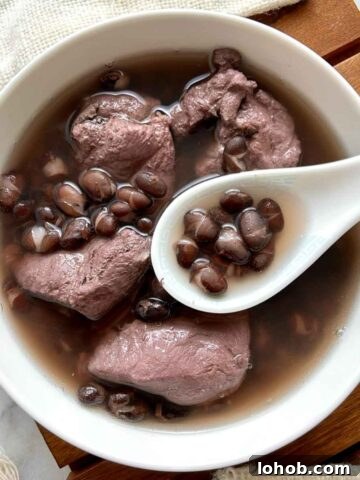 overhead shot of black bean soup in bowl