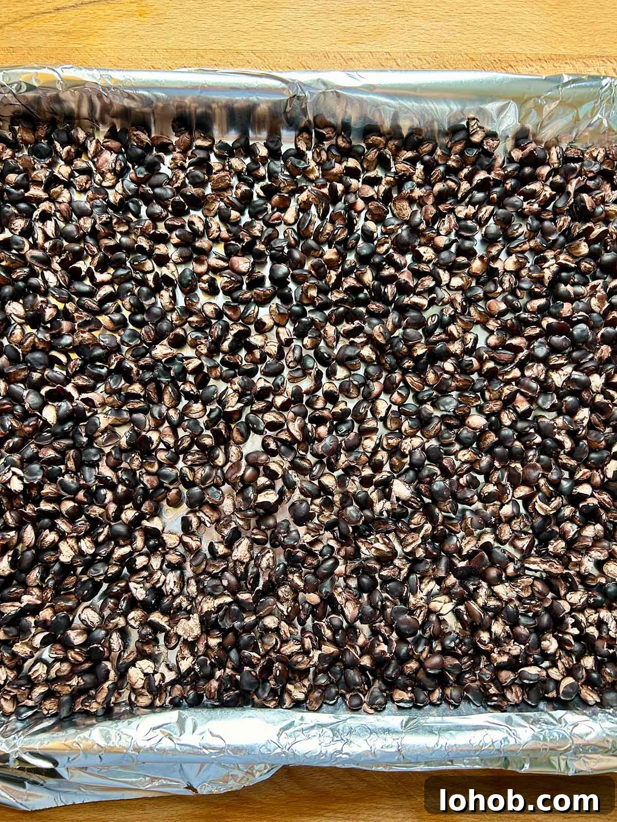Chickpea-Crusted Black Bean Burger Recipe for Crispy Veggie Burgers 5 cooked black beans in single layer on baking sheet