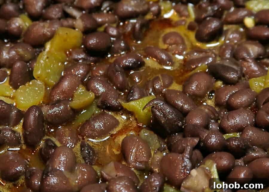Crispy Baked Black Bean Tacos – Vegan Gluten-Free Recipe 8 simmering the bean mixture for the Crispy Baked Black Bean Tacos {Healthy, Vegan, Gluten-free}