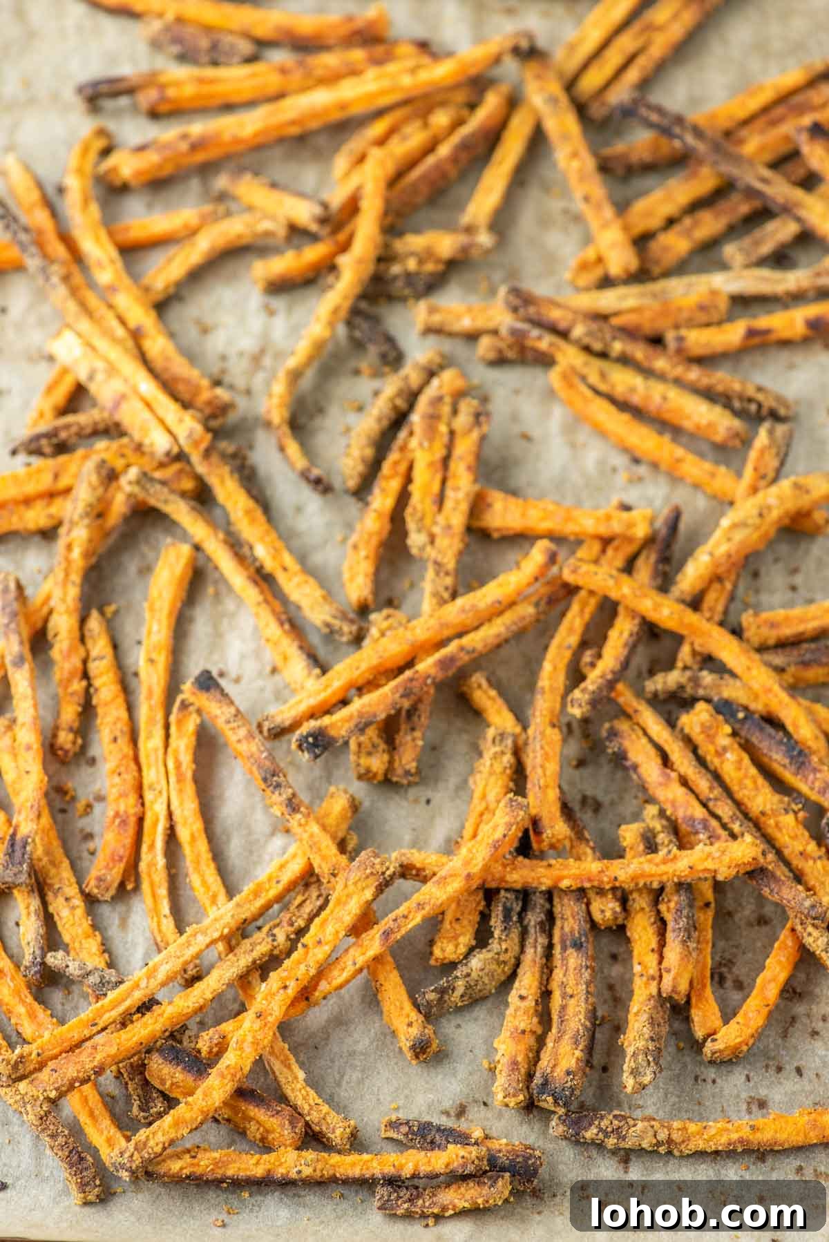 Crispy Oven-Baked Sweet Potato Fries Recipe 5 oven baked sweet potato fries on baking sheet