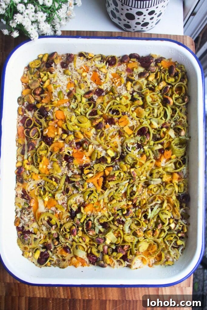 Celebration rice baked in a large white oven dish.