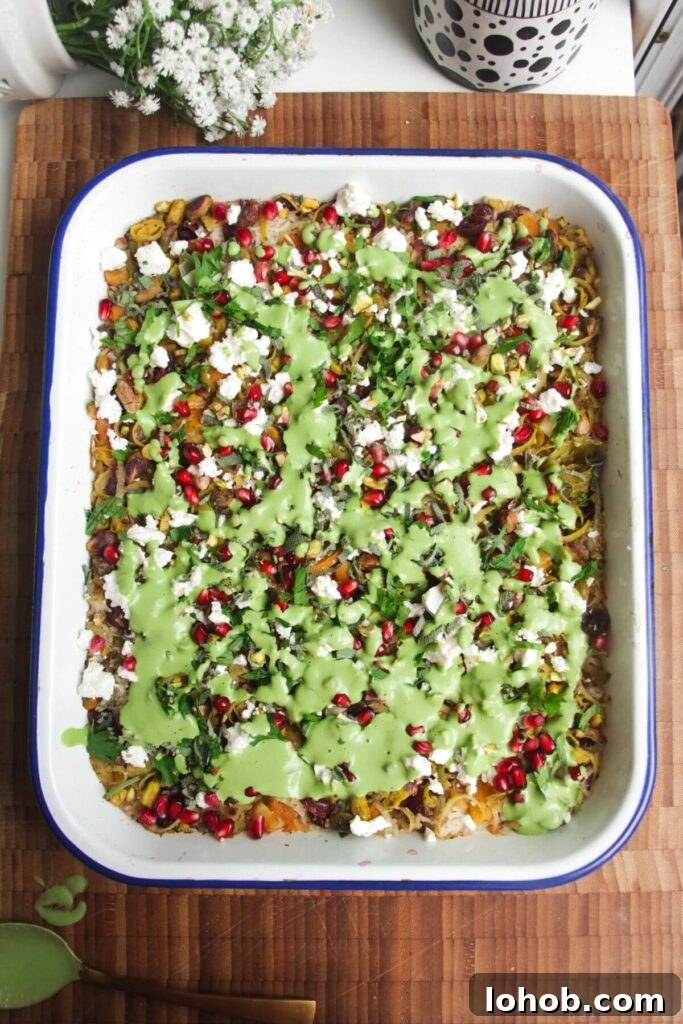 Green tahini sauce on rice.