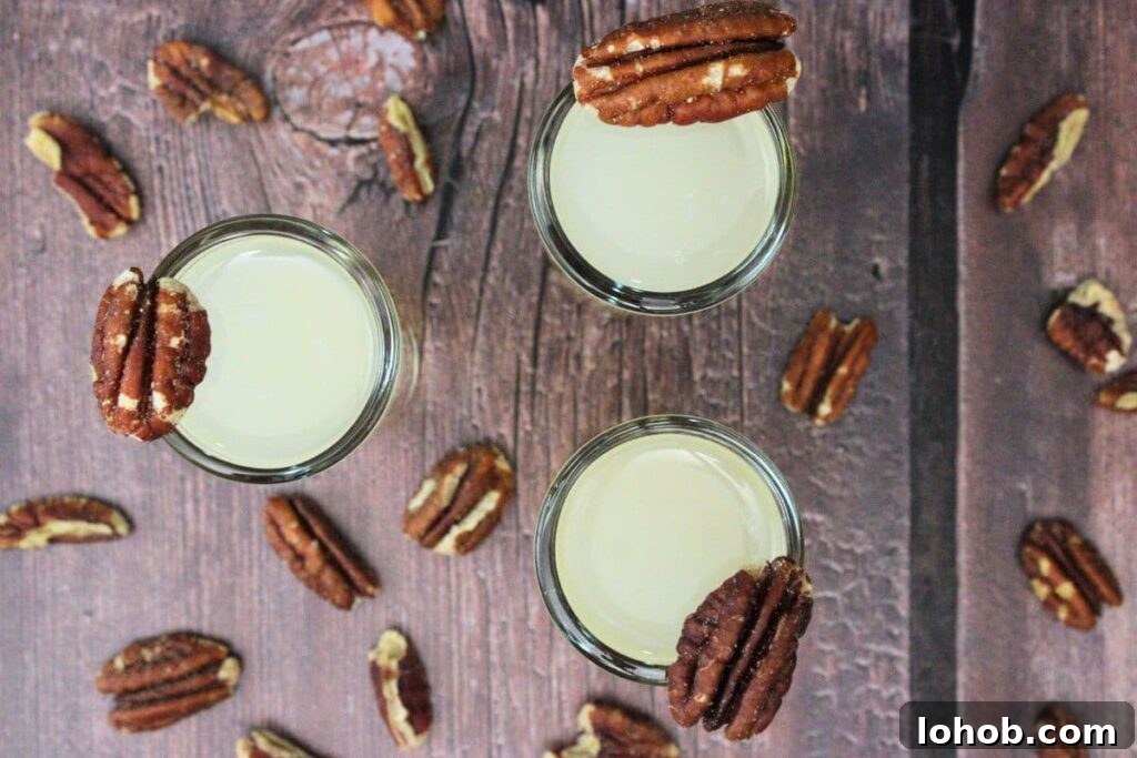 Pecan Pie Shot Recipe: Thanksgiving Vodka Shooter Guide 8 overhead view of three pecan pie shots with fresh pecans