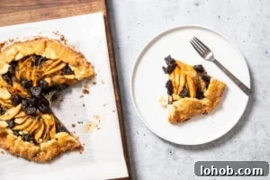 Flaky Rustic Fruit Galette Recipe for Perfect Summer Desserts 11 apple and prune galette recipe prepared with a slice out