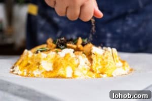 Flaky Rustic Fruit Galette Recipe for Perfect Summer Desserts 10 putting sugar on the outside of a galette