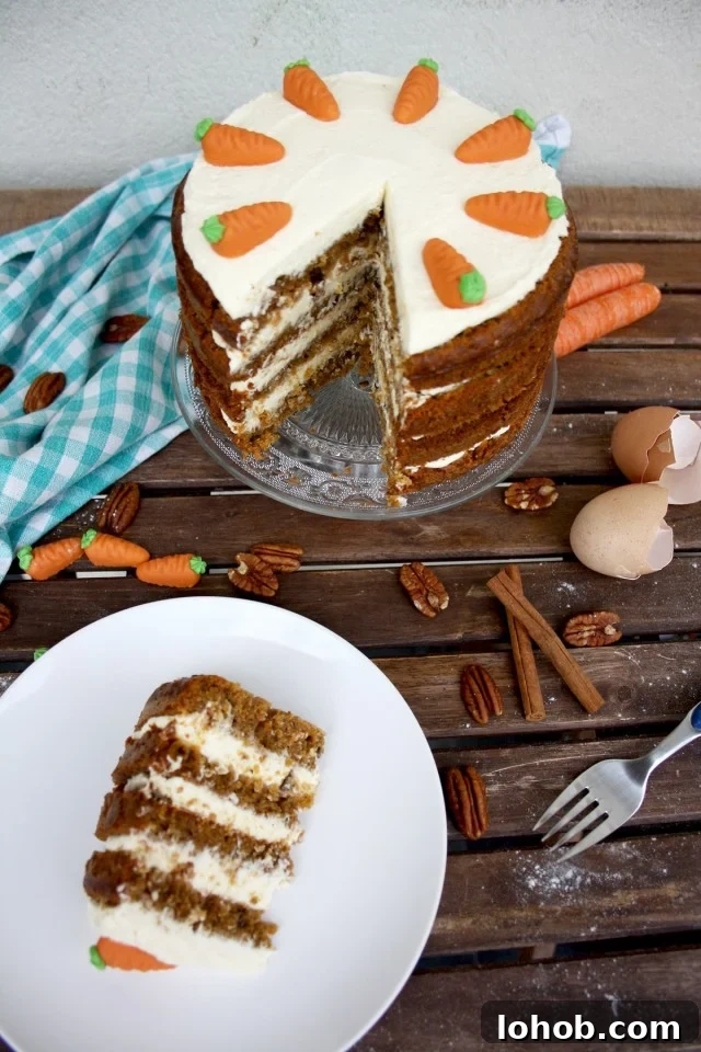 Super Moist Carrot Cake with Vanilla Cream Cheese Frosting - Serving on a White Plate