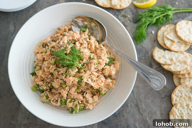 Fresh Mediterranean Salmon Salad with Lemon Herb Dressing 8 Cold Salmon Salad in Bowl with Dill and Celery