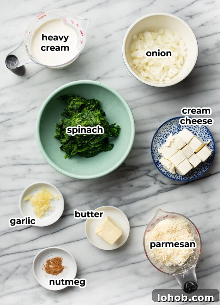 ingredients for creamed spinach in prep bowls