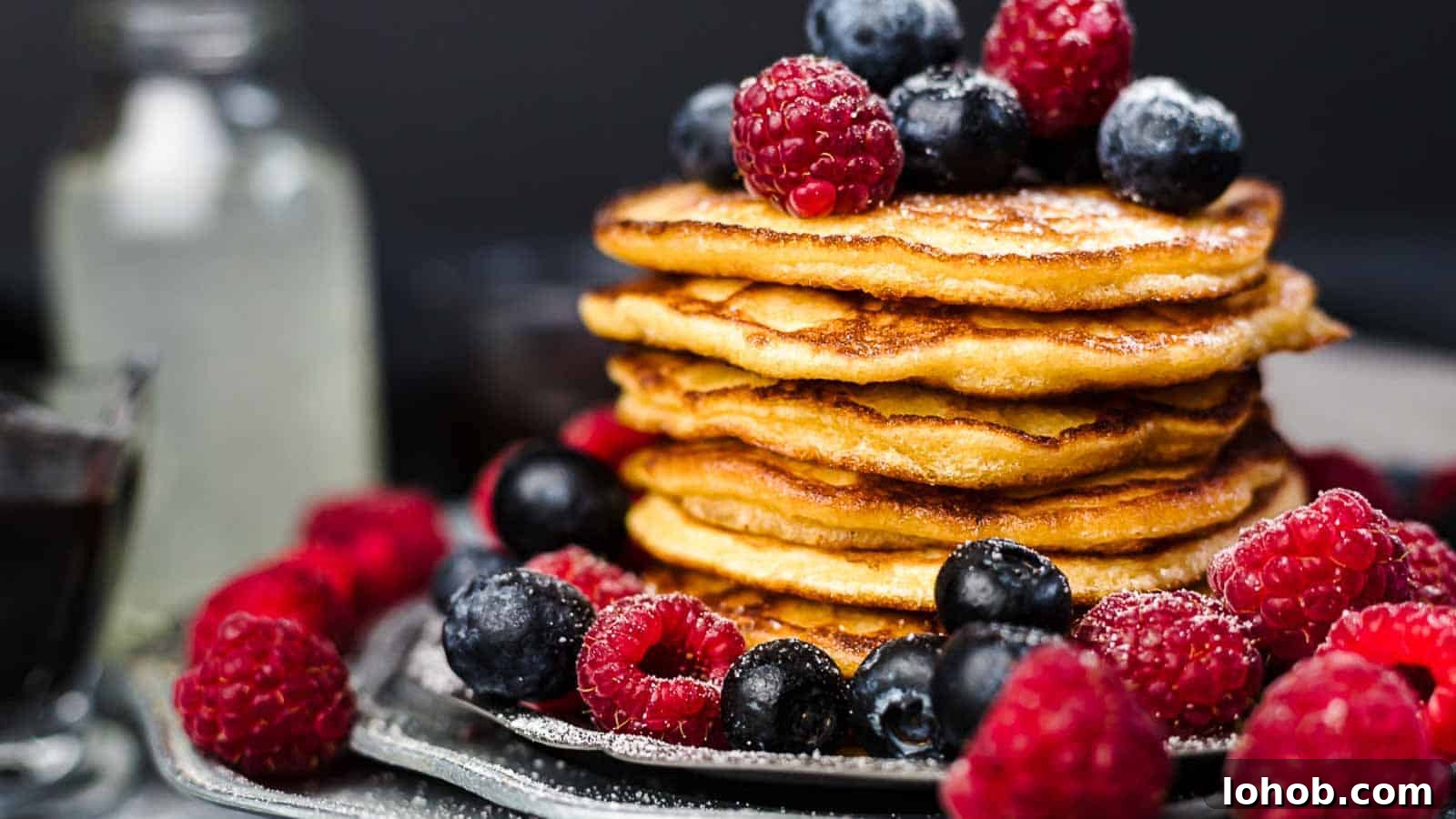 25 Morning Breakfast Ideas to Refresh Your Weekly Menu 14 Keto Pancakes on top of each other with berries.