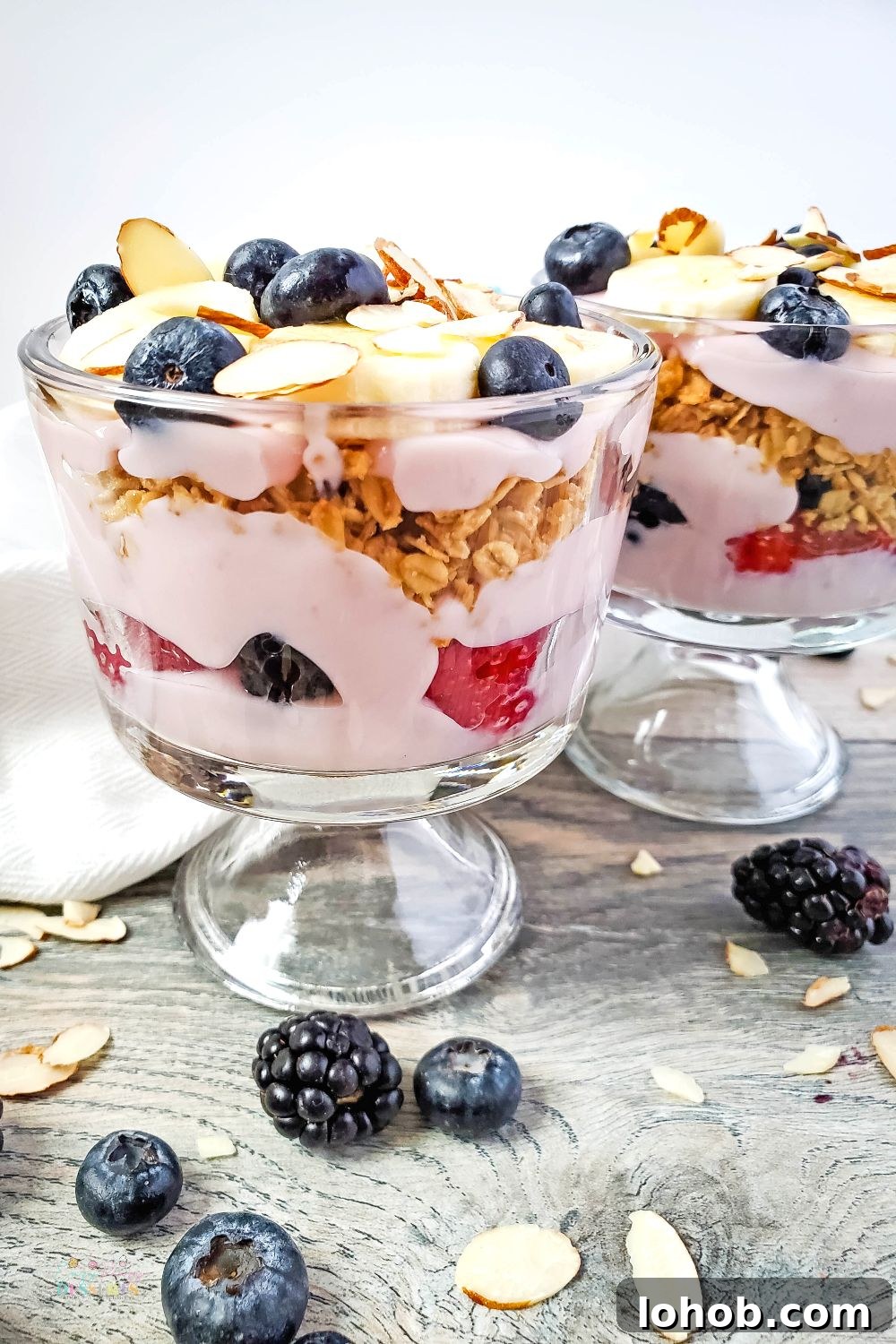 Berry Yogurt and Banana Trifle Recipe — Layered Summer Dessert 2 Close up image of berry trifle in cups