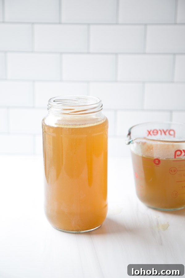 Gut-Healing Low FODMAP Chicken Stock Recipe (Gluten-Free) 2 Gut-Healing Low FODMAP Chicken Stock in a jar