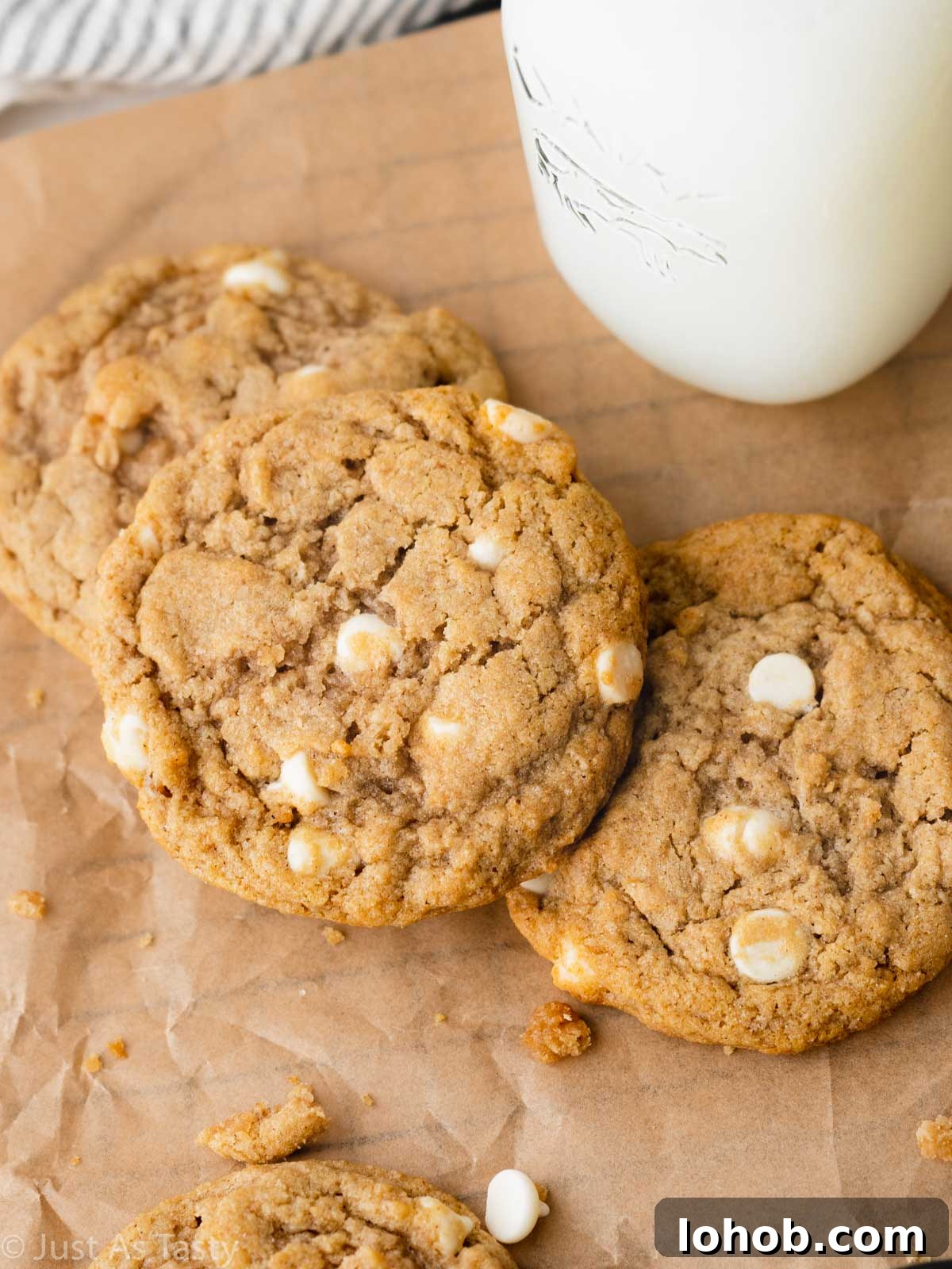 Chewy Apple Cinnamon Cookie Recipe for Soft, Spiced Treats 3 Close-up of apple cinnamon cookies on brown parchment.