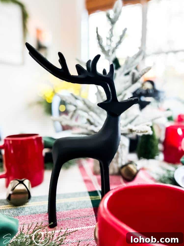 black metal reindeer in middle of tablescape