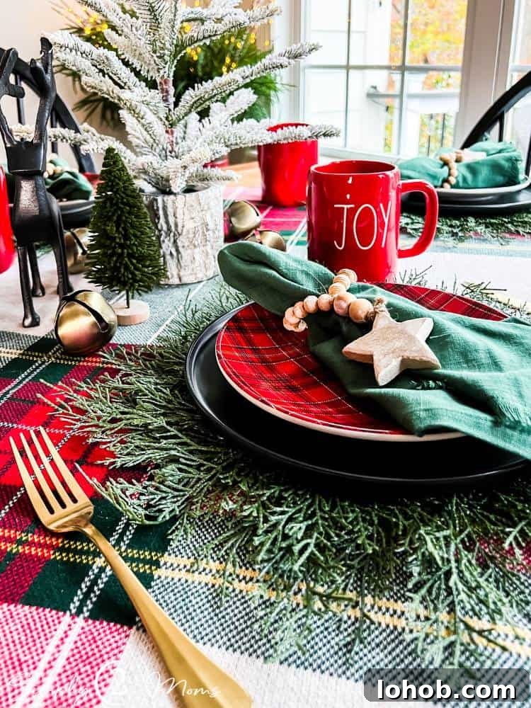 gold flatware next to holiday place setting on kitchen table
